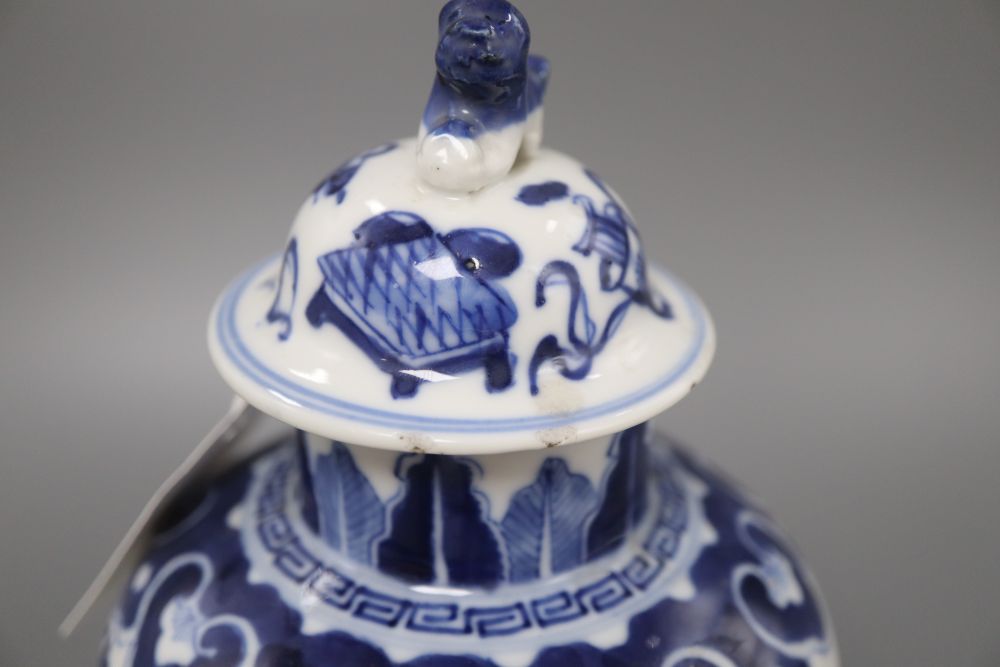 A Chinese blue and white Buddhist Emblems vase and cover, Kangxi mark but c. 1900, overall height 26.5cm